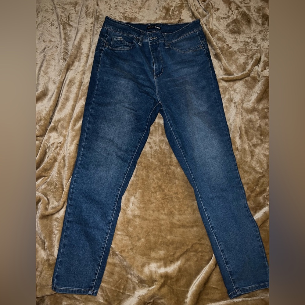 These are size 12, Medium wash denim jeans from Fashionova